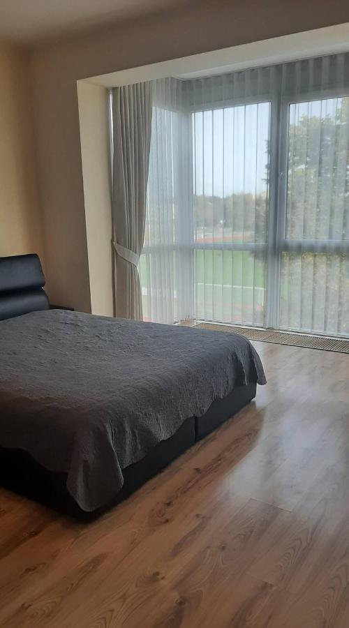 Апартаменти Jaukus Apartamentai Шяуляй Екстер'єр фото